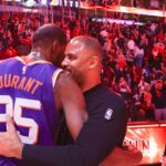 Phoenix Suns forward Kevin Durant (35) hugs Houston Rockets head coach Ime Udoka after a game at Toyota Center.