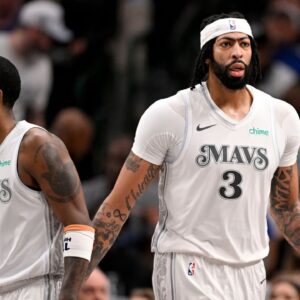 Kyrie Irving (L) and Anthony Davis (R)