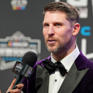 Nov 22, 2024; Charlotte, NC, USA; NASCAR Cup Series driver Denny Hamlin (11) during the NASCAR Awards Banquet at Charlotte Convention Center. Mandatory Credit: Jim Dedmon-Imagn Images