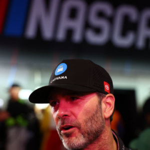Feb 13, 2025; Daytona Beach, Florida, USA; NASCAR Cup Series driver Jimmie Johnson (84) during driver introductions for the Duels at Daytona International Speedway. Mandatory Credit: Peter Casey-Imagn Images