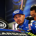 NASCAR Cup Series driver Kyle Larson (5) gets into his car during practice for the Daytona 500 at Daytona International Speedway.