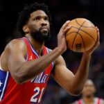 Philadelphia 76ers center Joel Embiid (21) shoots in the first half against the Detroit Red Wings at Little Caesars Arena.