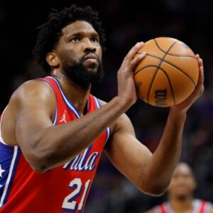 Philadelphia 76ers center Joel Embiid (21) shoots in the first half against the Detroit Red Wings at Little Caesars Arena.