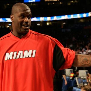 NBA All-Star Game -- Shaquille O'Neal chats with legend Bill Russell before All-Star Game.
