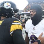 Nov 17, 2024; Pittsburgh, Pennsylvania, USA; Pittsburgh Steelers quarterback Russell Wilson (3) and Baltimore Ravens quarterback Lamar Jackson (8) meet at mid-field after playing at Acrisure Stadium.