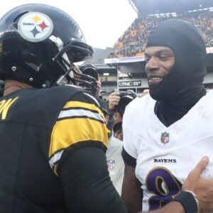 Nov 17, 2024; Pittsburgh, Pennsylvania, USA; Pittsburgh Steelers quarterback Russell Wilson (3) and Baltimore Ravens quarterback Lamar Jackson (8) meet at mid-field after playing at Acrisure Stadium.