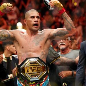 Alex Pereira (red gloves) reacts after defeating Khalil Rountree Jr. (not pictured) in a light heavyweight title bout during UFC 307 at Delta Center.