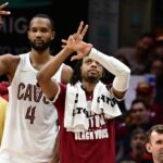 Cleveland Cavaliers forward Evan Mobley (4) and guard Darius Garland (10) celebrate after guard Sam Merrill (not pictured) hit a three point basket during the second half against the Dallas Mavericks at Rocket Mortgage FieldHouse