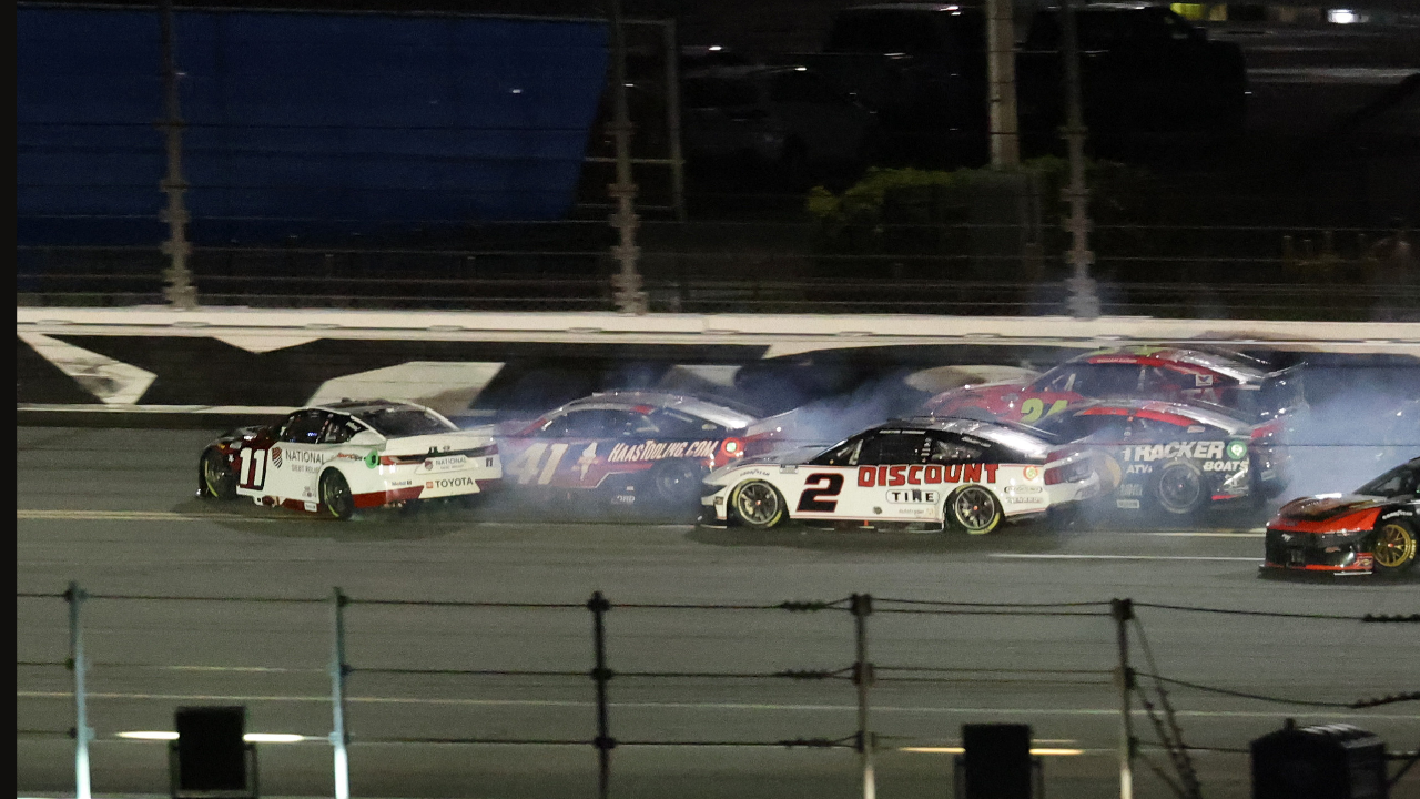 Feb 16, 2025; Daytona Beach, Florida, USA; NASCAR Cup Series driver Denny Hamlin (11), driver Cole Custer (41) and driver Corey LaJoie (01) wreck on the final lap during the Daytona 500 at Daytona International Speedway. Mandatory Credit: Mark J. Rebilas-Imagn Images