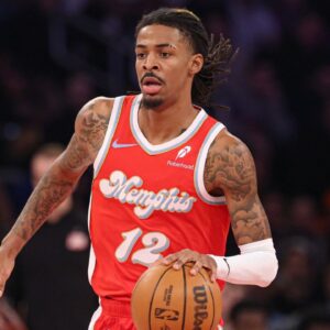 Memphis Grizzlies guard Ja Morant (12) dribbles up court during the first half against the Memphis Grizzlies at Madison Square Garden.