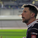 Denny Hamlin gets out of his car and checks out the screen during the Daytona 500 Pole Qualifying at Daytona International Speedway on Wednesday, Feb.12, 2025.