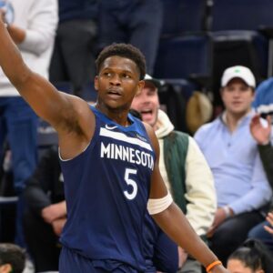 Minnesota Timberwolves guard Anthony Edwards (5) acknowledges the crowd after he is taken out against the Chicago Bulls with a game high 49-points during the fourth quarter at Target Center.