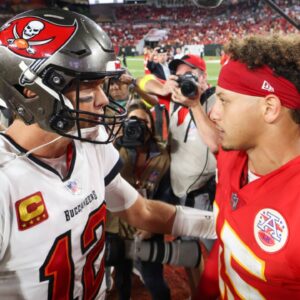 Oct 2, 2022; Tampa, Florida, USA; Tampa Bay Buccaneers quarterback Tom Brady (12) greets Kansas City Chiefs quarterback Patrick Mahomes (15) after a game at Raymond James Stadium.