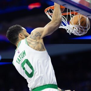 Boston Celtics forward Jayson Tatum (0) dunks the ball against the Philadelphia 76ers during the second quarter at Wells Fargo Center