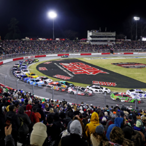NASCAR Cup Series driver Chase Elliot (9) and NASCAR Cup Series driver Chris Buescher (17) lead a restart during the Clash at Bowman Gray at Bowman Gray Stadium.