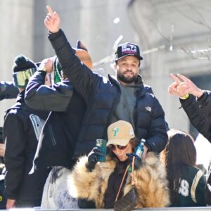 Eagles player, DARIUS SLAY JR and family during the Eagles Championship parade on Broad Street in Philadelphia PA Philadelphia United States