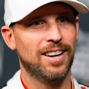 Feb 12, 2025; Daytona Beach, Florida, USA; NASCAR Cup Series driver Denny Hamlin during Daytona 500 media day at Daytona International Speedway. Mandatory Credit: Mark J. Rebilas-Imagn Images