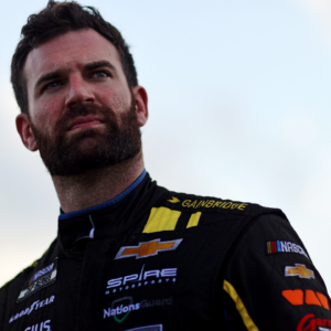 Aug 10, 2024; Richmond, Virginia, USA; NASCAR Cup Series driver Corey LaJoie (7) during practice and qualifying for the Cook Out 400 at Richmond Raceway. Mandatory Credit: Peter Casey-Imagn Images