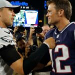 New England Patriots quarterback Tom Brady (12) meets Philadelphia Eagles quarterback Nick Foles (9) after the game at Gillette Stadium. Patriots defeated the Eagle 37-20.