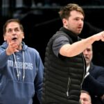 Dallas Mavericks guard Luka Doncic (right) and Mark Cuban (left) argue a call during the second half of the game against the New Orleans Pelicans at the American Airlines Center