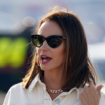 Samantha Busch walks down pit road prior to the Cook Out Southern 500 at Darlington Raceway.