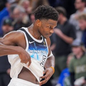 Minnesota Timberwolves guard Anthony Edwards (5) walks off the court after losing to the Milwaukee Bucks at Target Center.