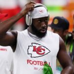 Feb 9, 2025; New Orleans, LA, USA; Kansas City Chiefs defensive end Charles Omenihu (90) warms up before Super Bowl LIX between the Philadelphia Eagles and the Kansas City Chiefs at Caesars Superdome.