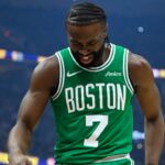 Boston Celtics guard Jaylen Brown (7) reacts in the first quarter against the Cleveland Cavaliers at Rocket Mortgage FieldHouse