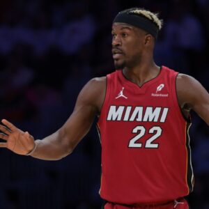 Miami Heat forward Jimmy Butler (22) reacts against the Portland Trail Blazers during the third quarter at Kaseya Center.