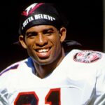 Atlanta Falcons defensive back Deion Sanders (21) walks onto the field prior to a game against the Los Angeles Rams at Anaheim Stadium.