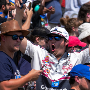 Fans cheer as the race begins at Atlanta Motor Speedway.