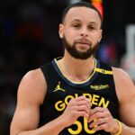 Golden State Warriors guard Stephen Curry (30) looks on in the first quarter against the Milwaukee Bucks at Fiserv Forum.