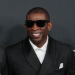 Feb 6, 2025; New Orleans, LA, USA; Deion Sanders with his sons Shedeur Sanders (left) and Deion Sanders Jr. (right) on the red carpet before Super Bowl LIX NFL Honors at Saenger Theatre.