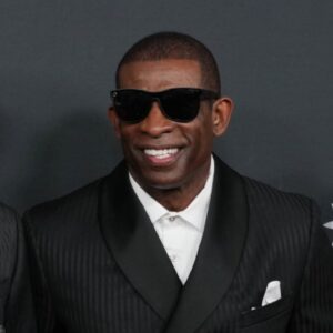 Feb 6, 2025; New Orleans, LA, USA; Deion Sanders with his sons Shedeur Sanders (left) and Deion Sanders Jr. (right) on the red carpet before Super Bowl LIX NFL Honors at Saenger Theatre.