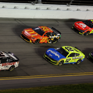 Daytona Beach, Florida, USA; NASCAR Cup Series driver Austin Cindric (2) leads the field during the Daytona 500 at Daytona International Speedway.
