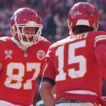 Dec 21, 2024; Kansas City, Missouri, USA; Kansas City Chiefs tight end Travis Kelce (87) celebrates with quarterback Patrick Mahomes (15) after Mahomes’ touchdown against the Houston Texans during the first half at GEHA Field at Arrowhead Stadium.