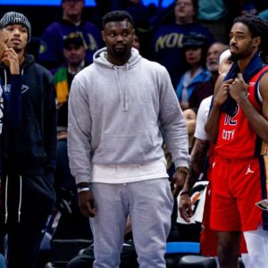 ; New Orleans Pelicans forward Zion Williamson (1) looks on with his teammates on a time out against the Sacramento Kings during the second half at Smoothie King Center.