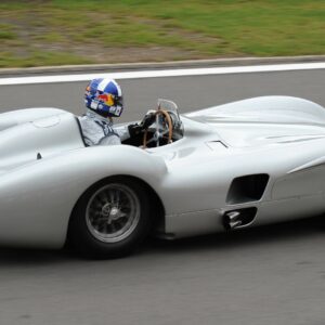 FORMER DRIVER DAVID COULTHARD DRIVING OLD SILVER ARROW 1954-1955 MERCEDES W196. GERMAN F1 GRAND PRIX 2011