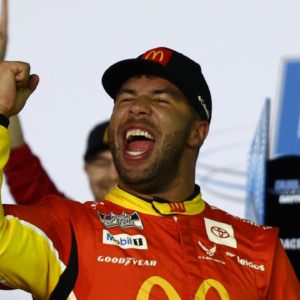 NASCAR Cup Series driver Bubba Wallace (23) reacts after winning Duel 1 at Daytona International Speedway.
