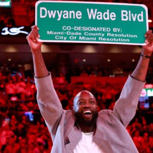 Former Miami Heat guard Dwyane Wade is honored with 'Dwayne Wade Blvd' during halftime against the Detroit Pistons at Kaseya Center.
