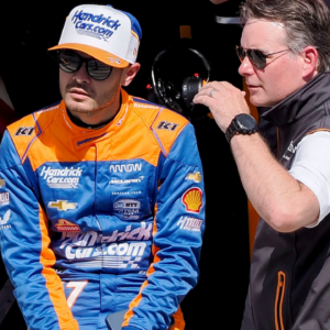 Arrow McLaren/Rick Hendrick driver Kyle Larson (17) sits on the pit wall as he talks with Jeff Gordon on Sunday, May 19, 2024, during Top 12 qualifying for the 108th running of the Indianapolis 500 at Indianapolis Motor Speedway.