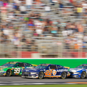 Sep 8, 2024; Hampton, Georgia, USA; NASCAR Cup Series driver Daniel Suarez (99), NASCAR Cup Series driver Joey Logano (22), and NASCAR Cup Series driver Ryan Blaney (12) fight for position along the stretch in the final laps at Atlanta Motor Speedway. Mandatory Credit: Jason Allen-Imagn Images