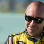 Nov 16, 2014; Homestead, FL, USA; Sprint Cup Series driver Marcos Ambrose (9) before the Ford EcoBoost 400 at Homestead-Miami Speedway. Mandatory Credit: Jerome Miron-Imagn Images