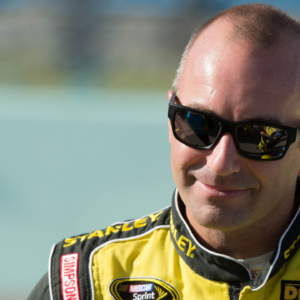 Nov 16, 2014; Homestead, FL, USA; Sprint Cup Series driver Marcos Ambrose (9) before the Ford EcoBoost 400 at Homestead-Miami Speedway. Mandatory Credit: Jerome Miron-Imagn Images