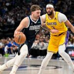 Dallas Mavericks guard Luka Doncic (77) and Los Angeles Lakers forward Anthony Davis (3) in action during the game between the Dallas Mavericks and the Los Angeles Lakers at the American Airlines Center.