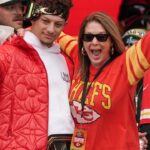 Kansas City Chiefs quarterback Patrick Mahomes (15) celebrates with his mother Randi Martin during the Kansas City Chiefs Super Bowl parade.