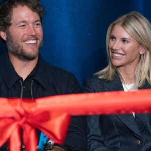 Mathew and Kelly Stafford share a laugh during speeches for the ribbon cutting of the Kelly and Matthew Stafford and Friends Education Center at the S.A.Y Detroit Play Center in Detroit on Monday, April 1, 2024.