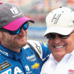 Monster Energy NASCAR Cup Series driver Dale Earnhardt Jr. (88) has a light moment before his last race with team owner Rick Hendrick during the Bank of American 500 at Charlotte Motor Speedway.