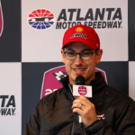 Feb 25, 2024; Hampton, Georgia, USA; NASCAR Cup Series driver Joey Logano (22) talks with the media prior to qualifying for the Ambetter Health 400 at Atlanta Motor Speedway. Mandatory Credit: David Yeazell-Imagn Images
