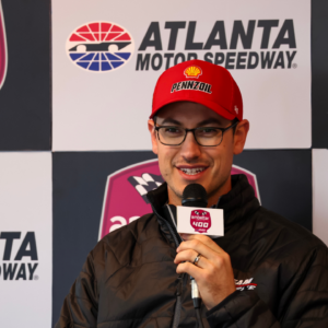 Feb 25, 2024; Hampton, Georgia, USA; NASCAR Cup Series driver Joey Logano (22) talks with the media prior to qualifying for the Ambetter Health 400 at Atlanta Motor Speedway. Mandatory Credit: David Yeazell-Imagn Images